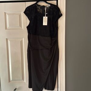 Brand new formal dress. Black with lace.